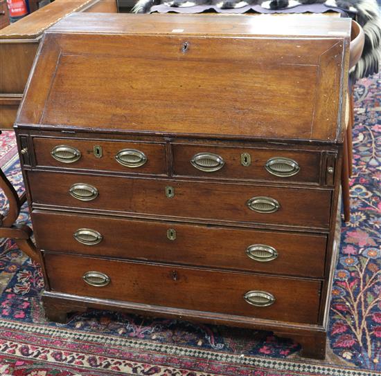 A George II oak bureau W.95cm